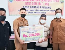 Kades Lingga Salurkan BLT dan Himbau Prokes